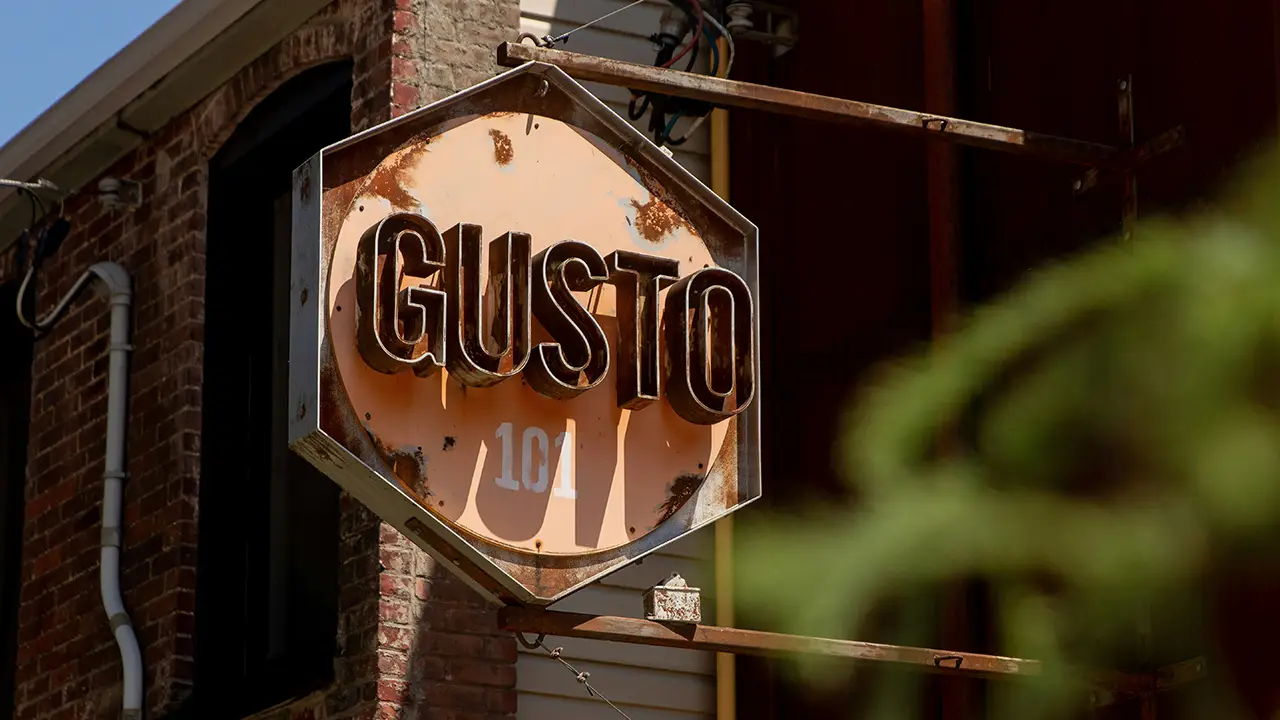 An image of Gusto 101's sign - a restaurant located in King West of Toronto, Ontario, Canada.